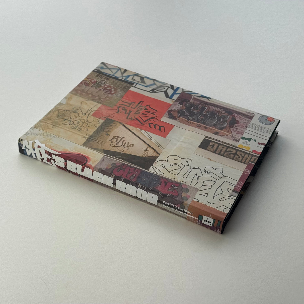 Shoe's Black Book Special Edition, hardcover in a slipcase covered with a collage of black book pages