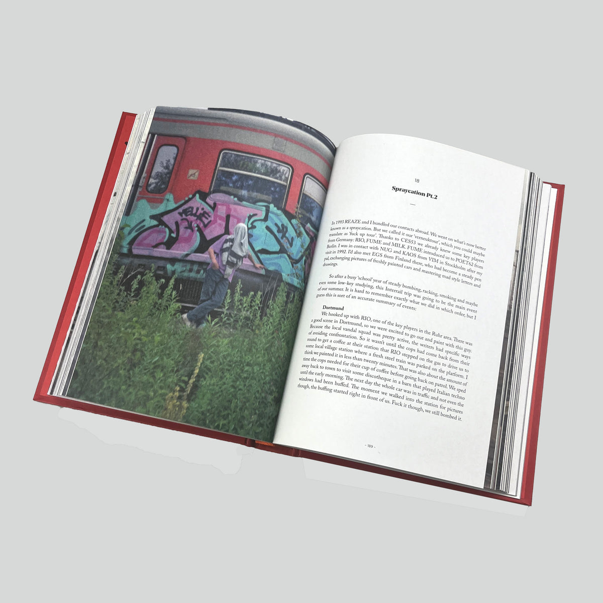 Catalogue of Unsolved Crimes, open spread with a photograph of a painted train and a page of text