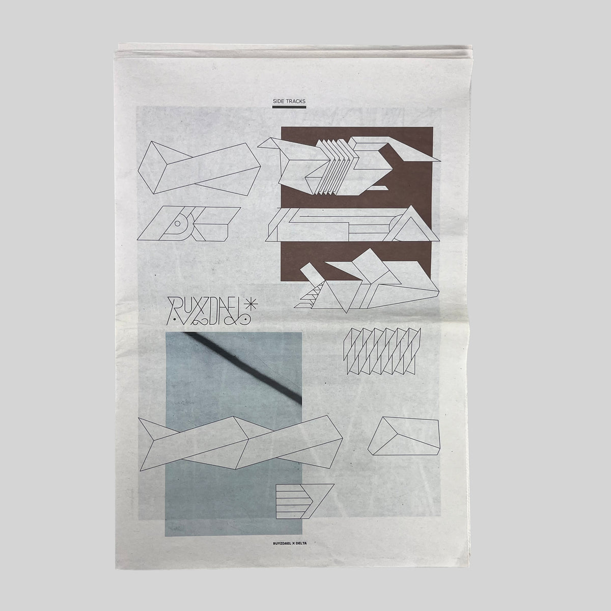Side Tracks, front of the newsprint cover with line drawings of letters