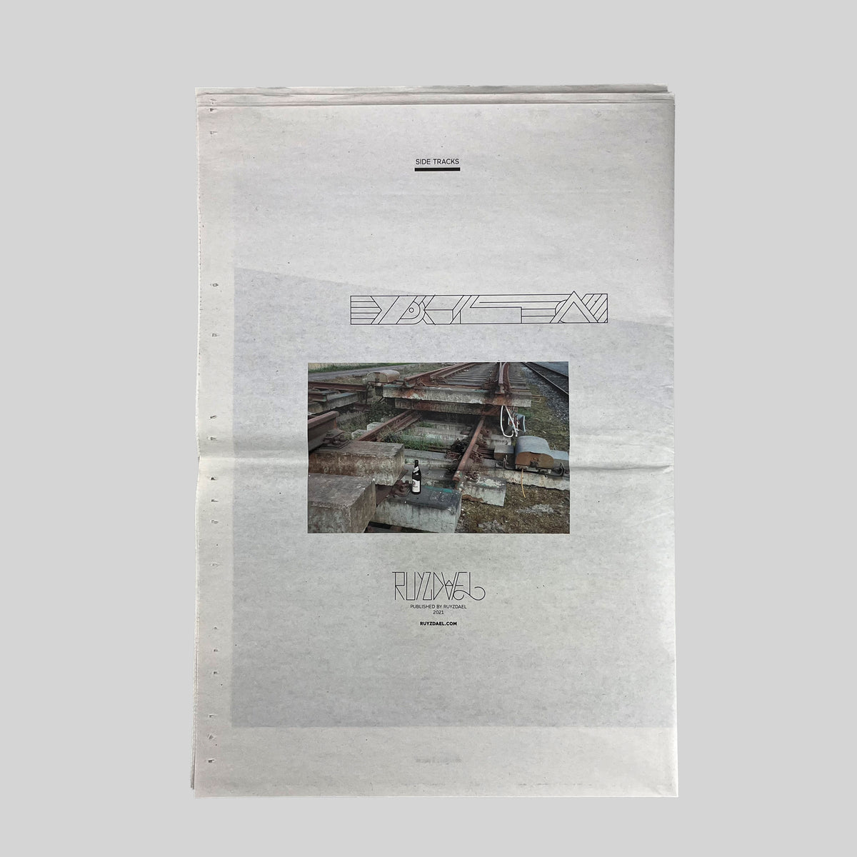 Side Tracks, newsprint cover with a photograph of railway tracks