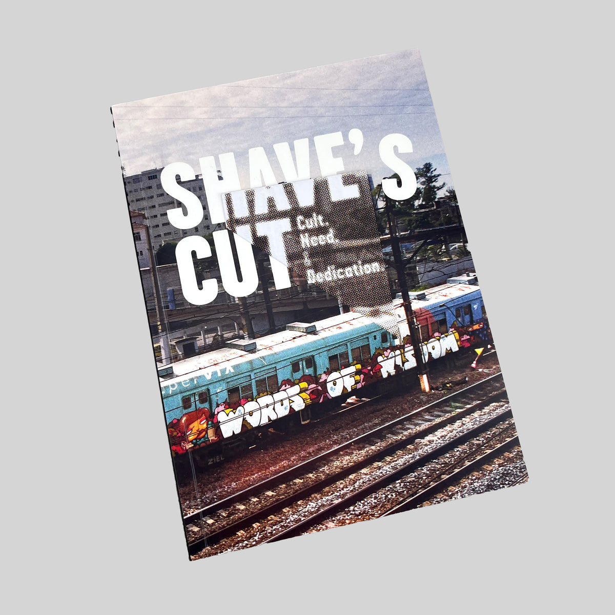 Shave's Cut, cover with a photograph of a painted train, seen at an angle