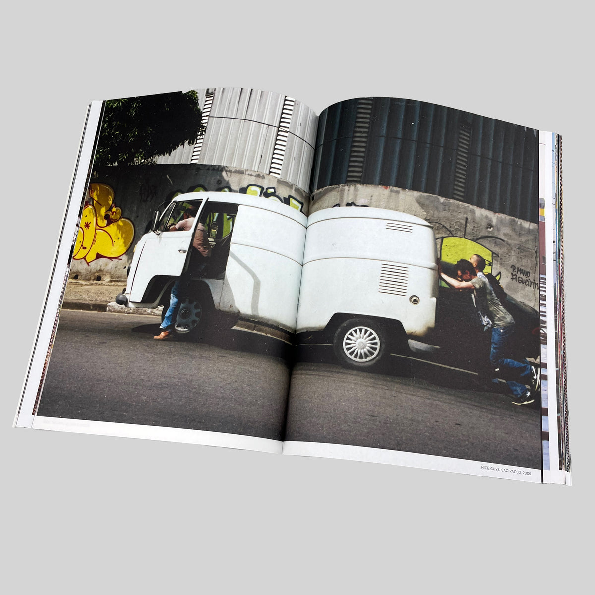 Shave's Cut, open spread with a photograph of a van next to a painted wall