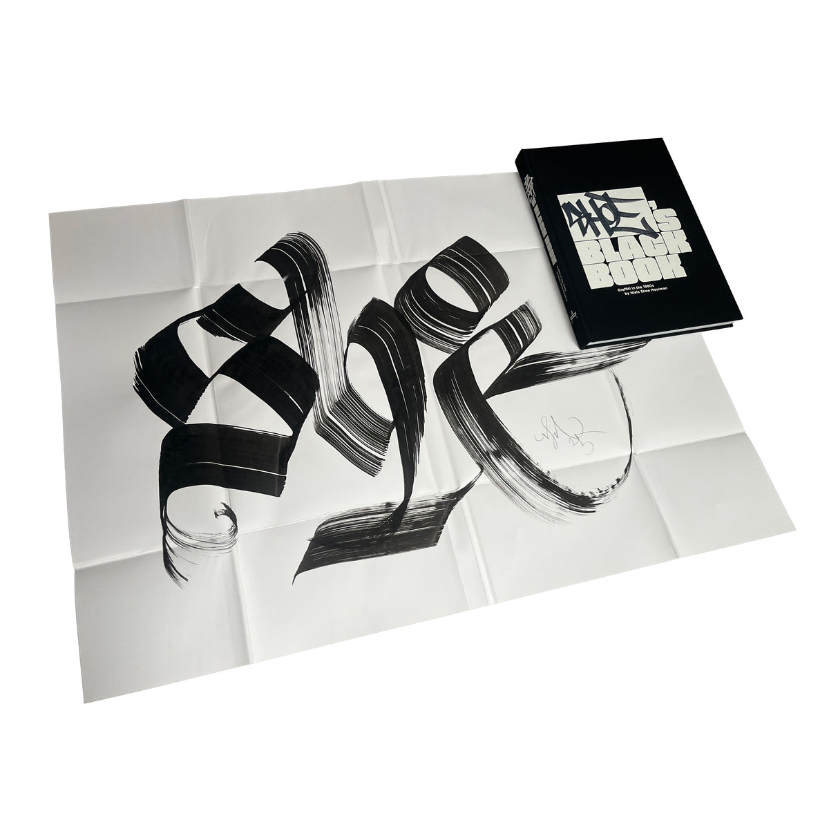 Shoe's Black Book Special Edition, folded poster with black brush lettering and the book