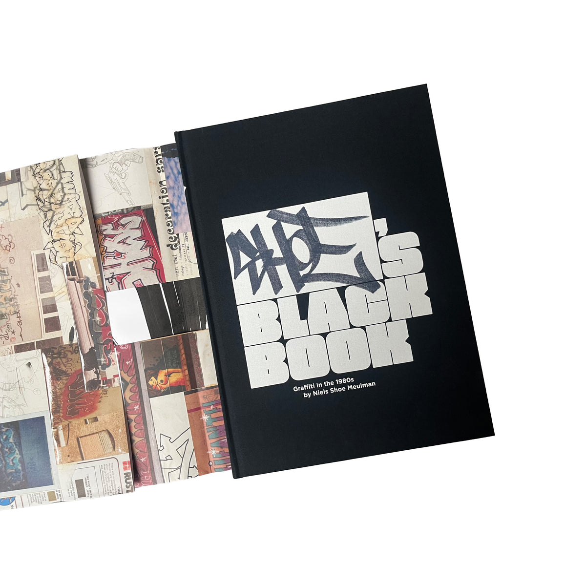 Shoe's Black Book Special Edition, black hardcover with the title in white, next to the collage slipcase