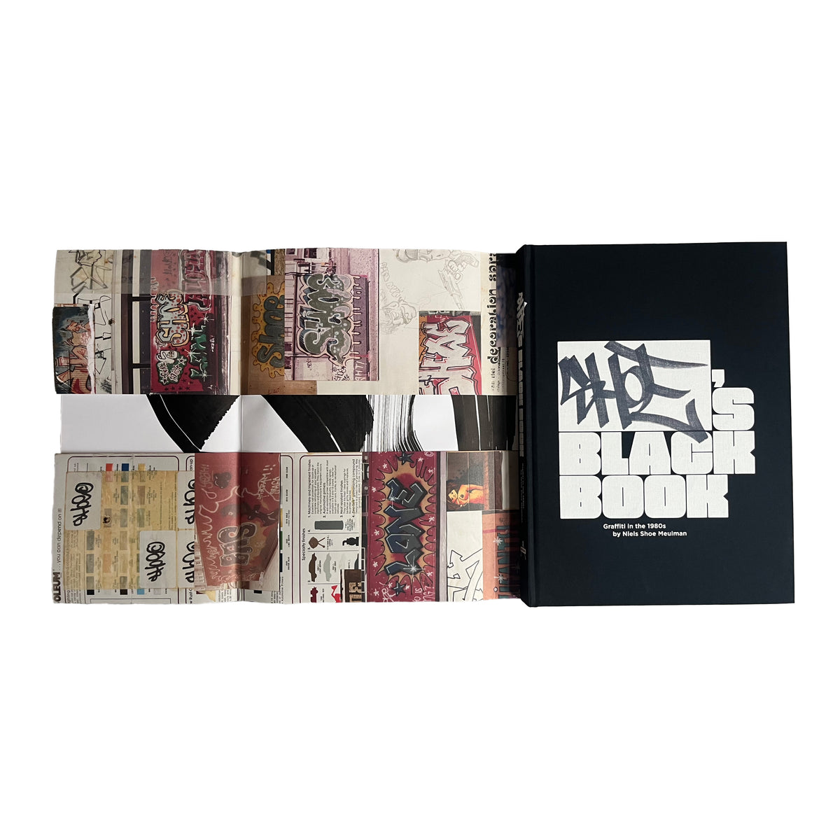 Shoe's Black Book Special Edition, black hardcover next to folded collage sheets