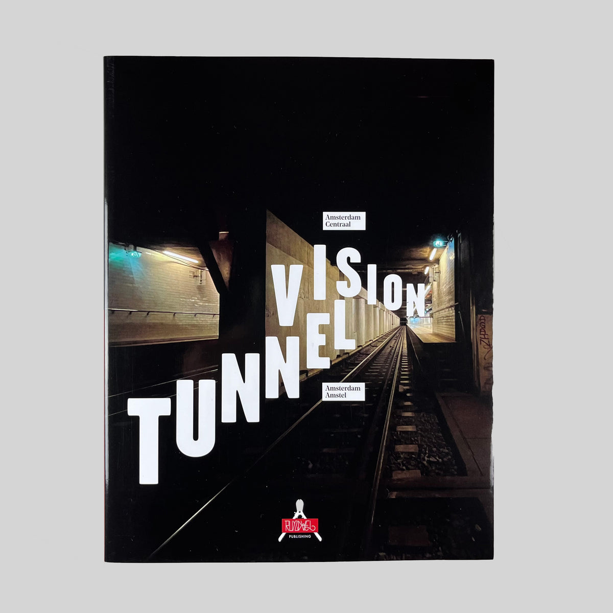 Tunnel Vision, dark cover with a metro tunnel and the title in white